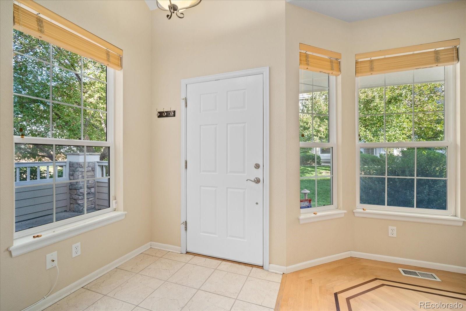 6115 Trailhead Road Highlands Ranch, CO 80130 - Photo 13 of 40 a view of a livingroom with a window