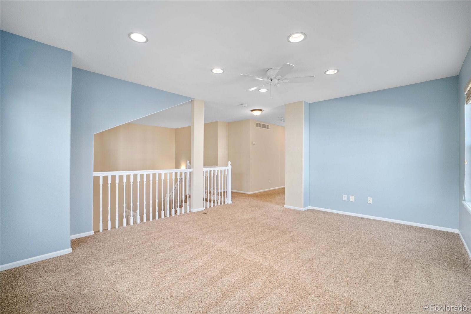 6115 Trailhead Road Highlands Ranch, CO 80130 - Photo 22 of 40 a view of a hallway