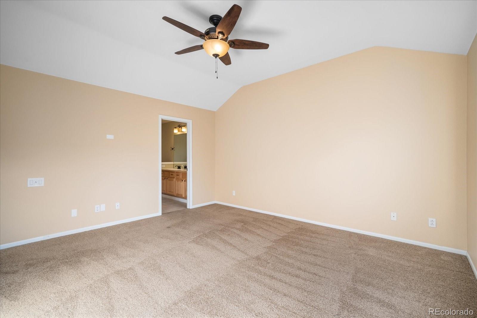 6115 Trailhead Road Highlands Ranch, CO 80130 - Photo 27 of 40 a view of a big room with carpet