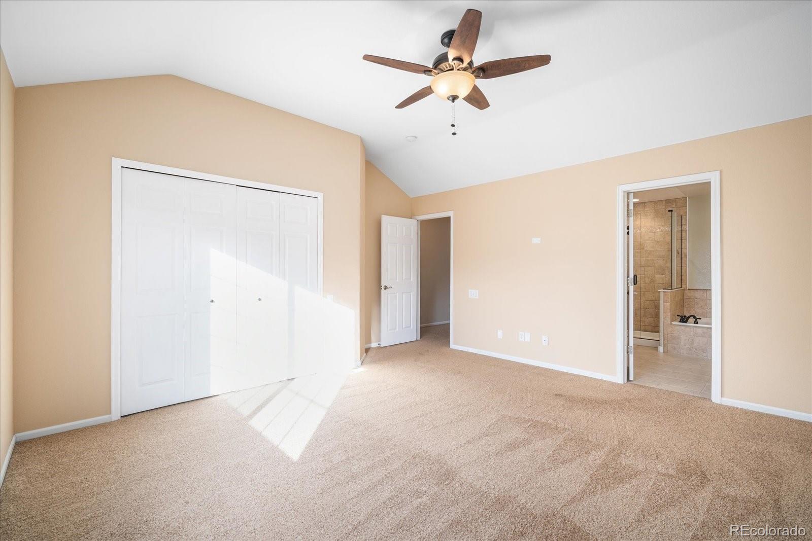 6115 Trailhead Road Highlands Ranch, CO 80130 - Photo 28 of 40 a view of a big room with carpet