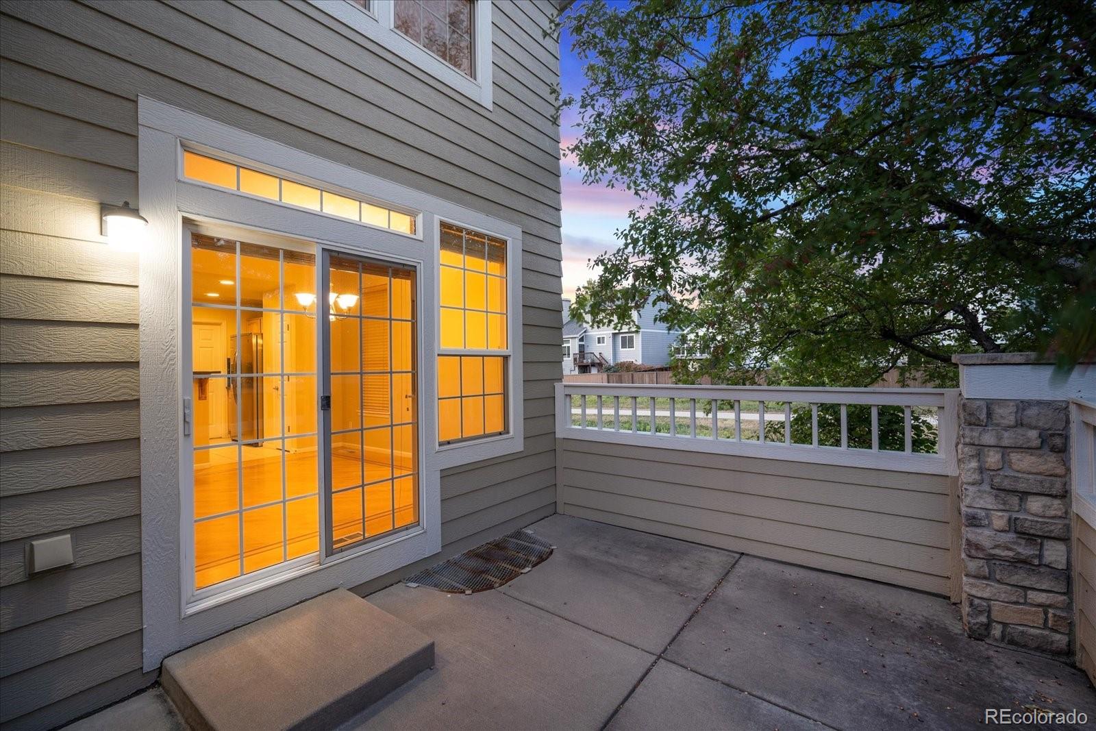 6115 Trailhead Road Highlands Ranch, CO 80130 - Photo 5 of 40 a view of front door and porch