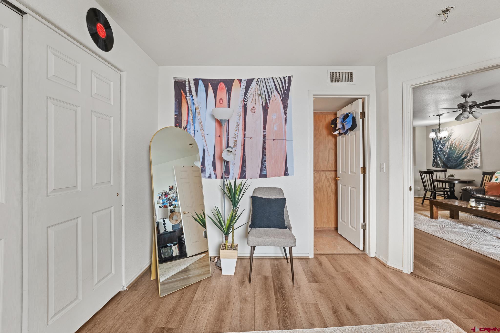 1100 Goeglein Gulch Road, Unit 206 Durango, CO 81301 - Photo 12 of 29 a view of a livingroom with furniture and wooden floor