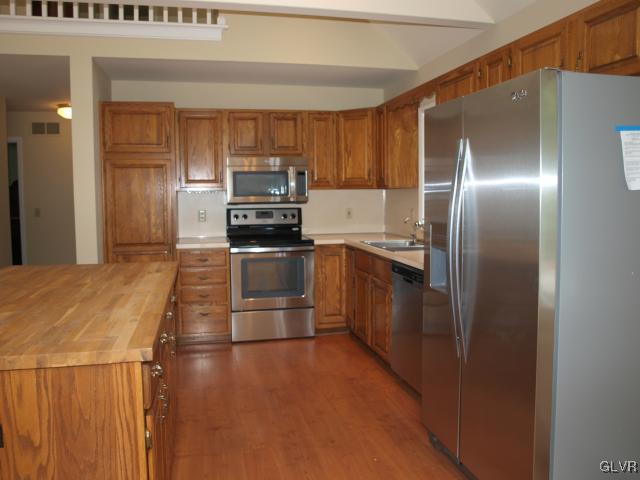 4952 Cedar Grove Road Bangor, PA 18013 - Photo 20 of 50 a kitchen with stainless steel appliances granite countertop a refrigerator a stove and a sink