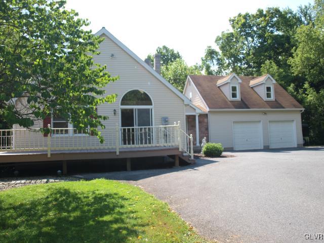 4952 Cedar Grove Road Bangor, PA 18013 - Photo 2 of 50 a front view of a house with a yard and potted plants