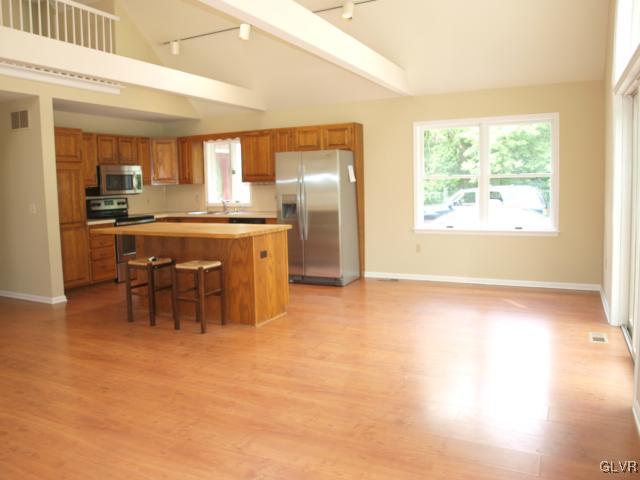4952 Cedar Grove Road Bangor, PA 18013 - Photo 21 of 50 a large kitchen with a table and chairs in it