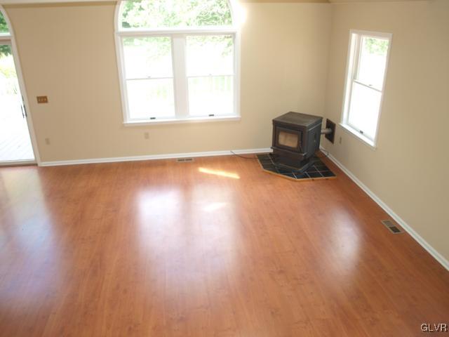 4952 Cedar Grove Road Bangor, PA 18013 - Photo 26 of 50 an empty room with wooden floor and windows