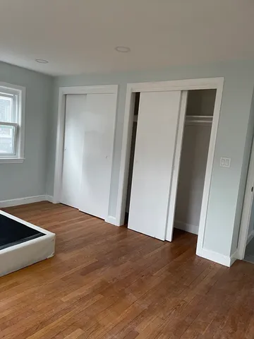 a bathroom with a sink vanity and tub