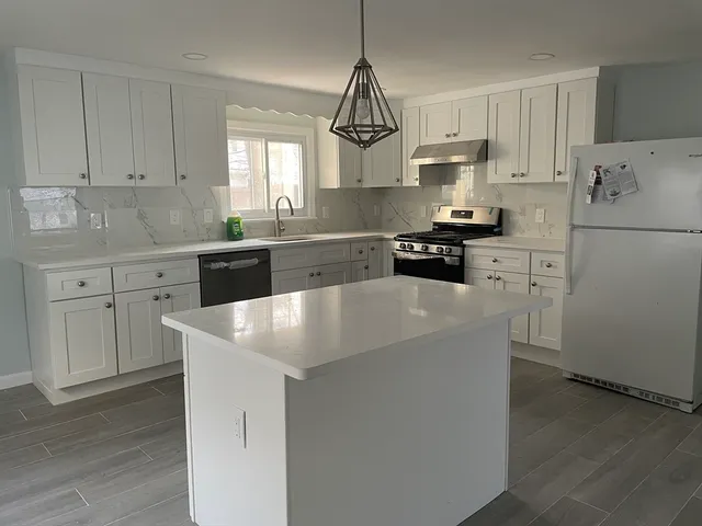 a bedroom with a bed and a closet