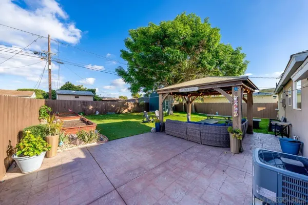a backyard of a house with lots of green space