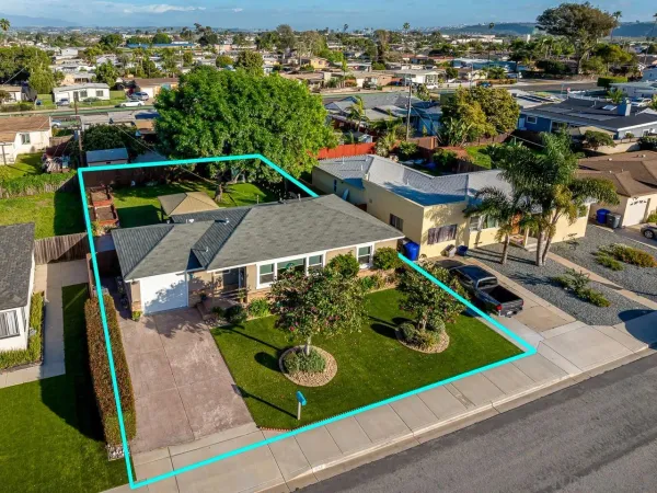 an aerial view of swimming pool patio and mountain view