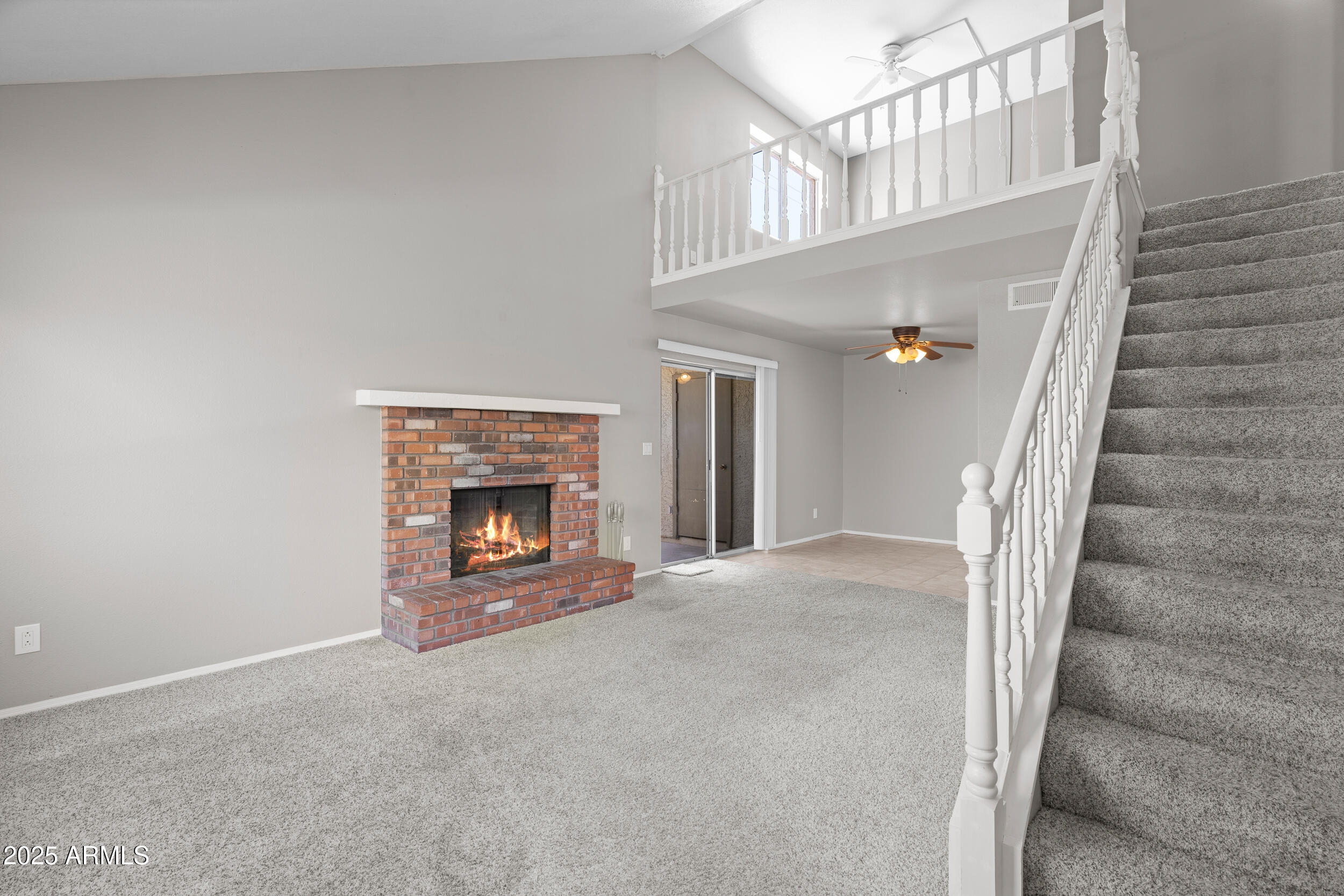 a view of a livingroom with a fireplace