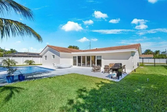 a view of a house with a patio