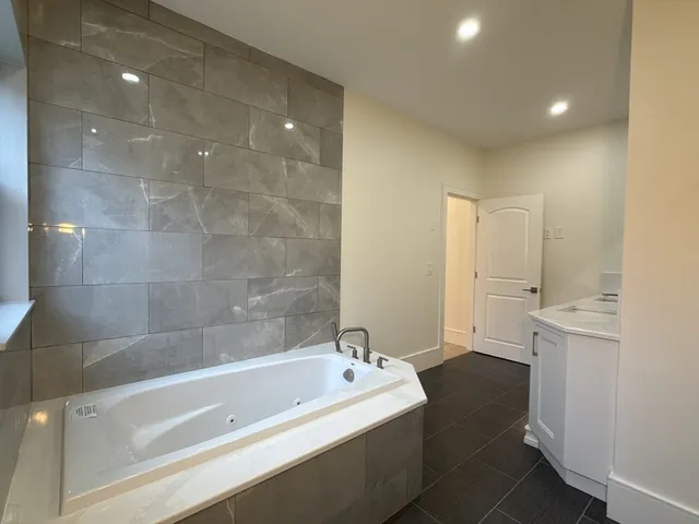 a bed room with furniture and wooden floor