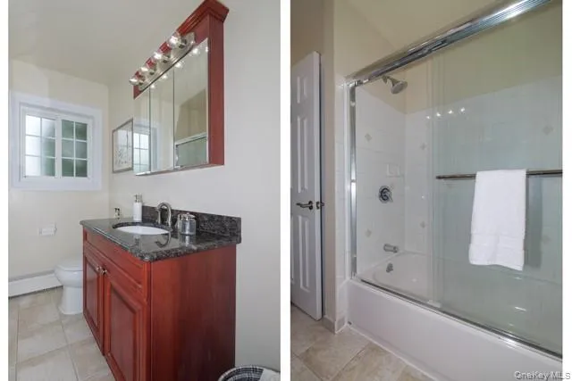 a bathroom with a granite countertop sink a mirror a bathtub and shower