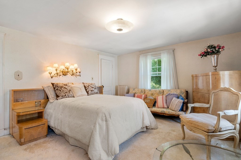 46 Rowe Street Milton, MA 02186 - Photo 15 of 20 a bedroom with bed and window