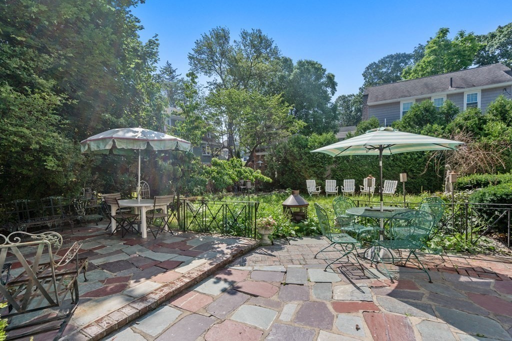 46 Rowe Street Milton, MA 02186 - Photo 19 of 20 a garden view with a seating space