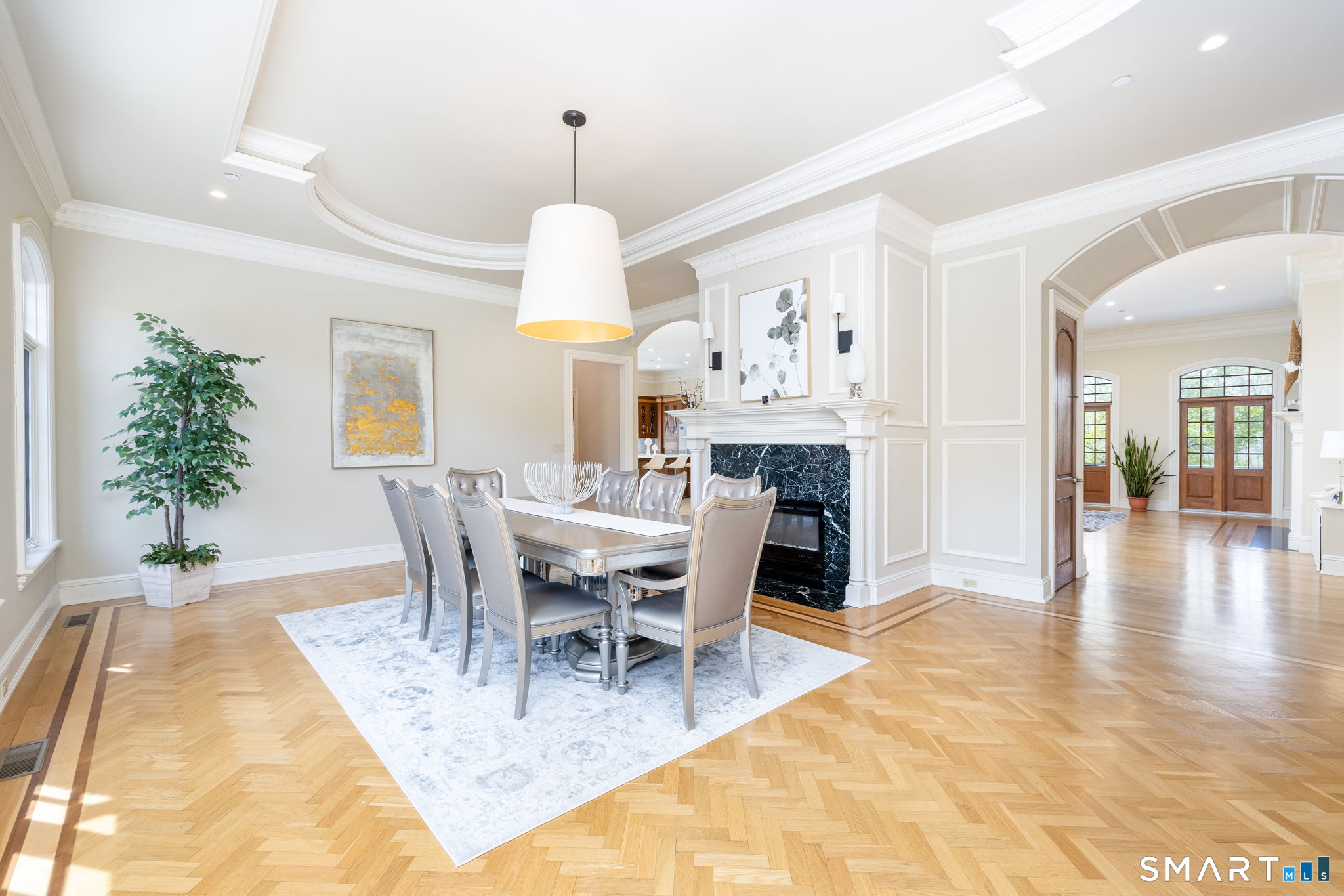 40 Parsons Way Avon, CT 06001 - Photo 15 of 40 Formal dining area with open flow showcases the incredible millwork throughout the home.
