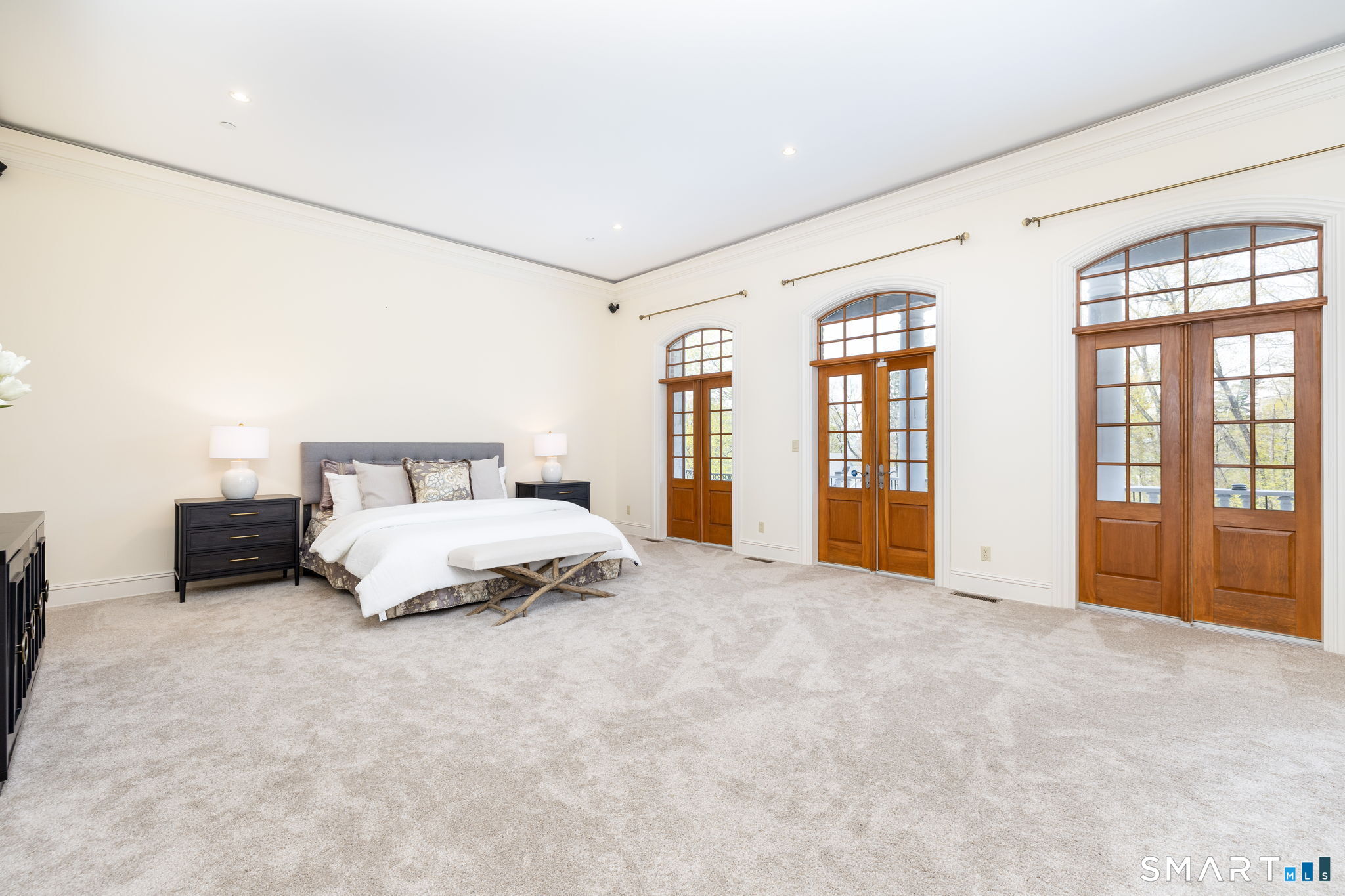 40 Parsons Way Avon, CT 06001 - Photo 21 of 40 Spacious primary bedroom with natural light and veranda