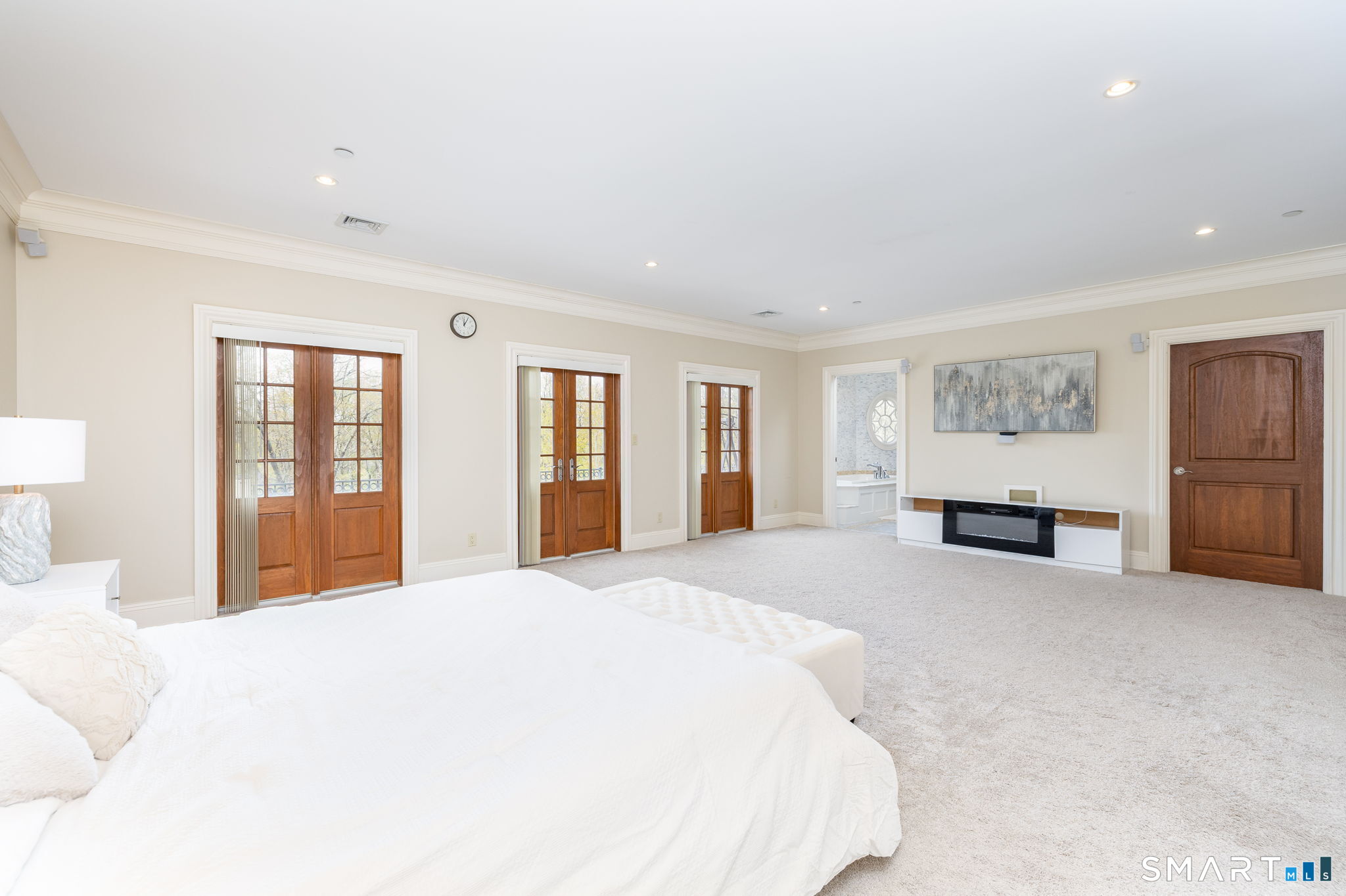 40 Parsons Way Avon, CT 06001 - Photo 32 of 40 Upstairs primary bedroom with bright natural lighting