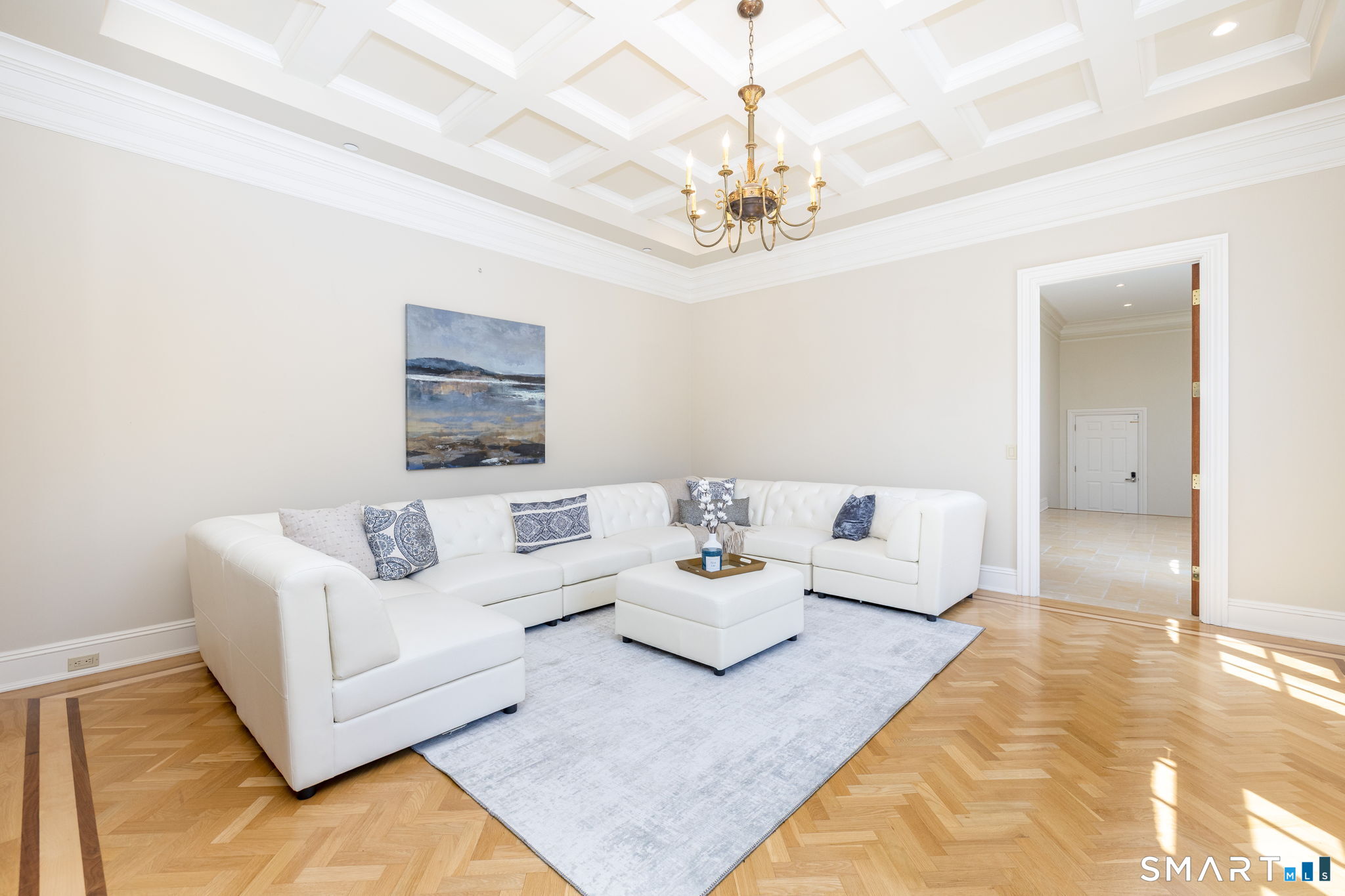 40 Parsons Way Avon, CT 06001 - Photo 9 of 40 Additional living room with herringbone floors and coffered ceiling.