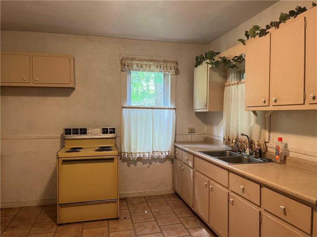 271-a Wendel Road Irwin, PA 15642 - Photo 12 of 19 a kitchen with cabinets and appliances