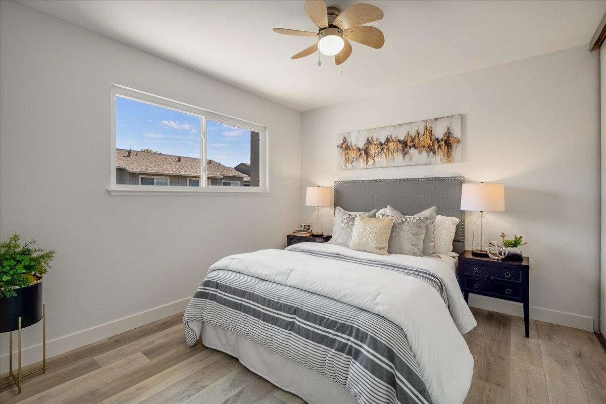 4790 Raspberry Place San Jose, CA 95129 - Photo 20 of 45 a bedroom with bed and wooden floor