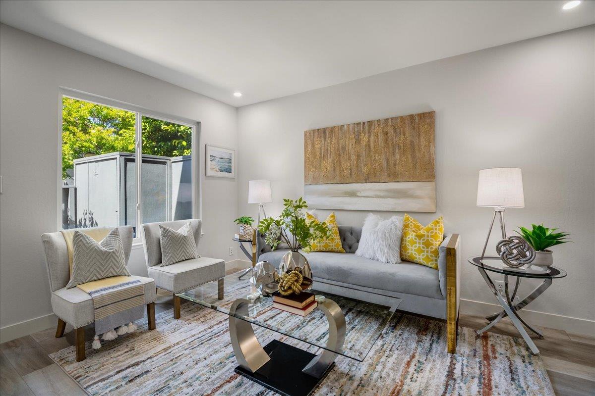 4790 Raspberry Place San Jose, CA 95129 - Photo 2 of 45 a living room with furniture and a potted plant