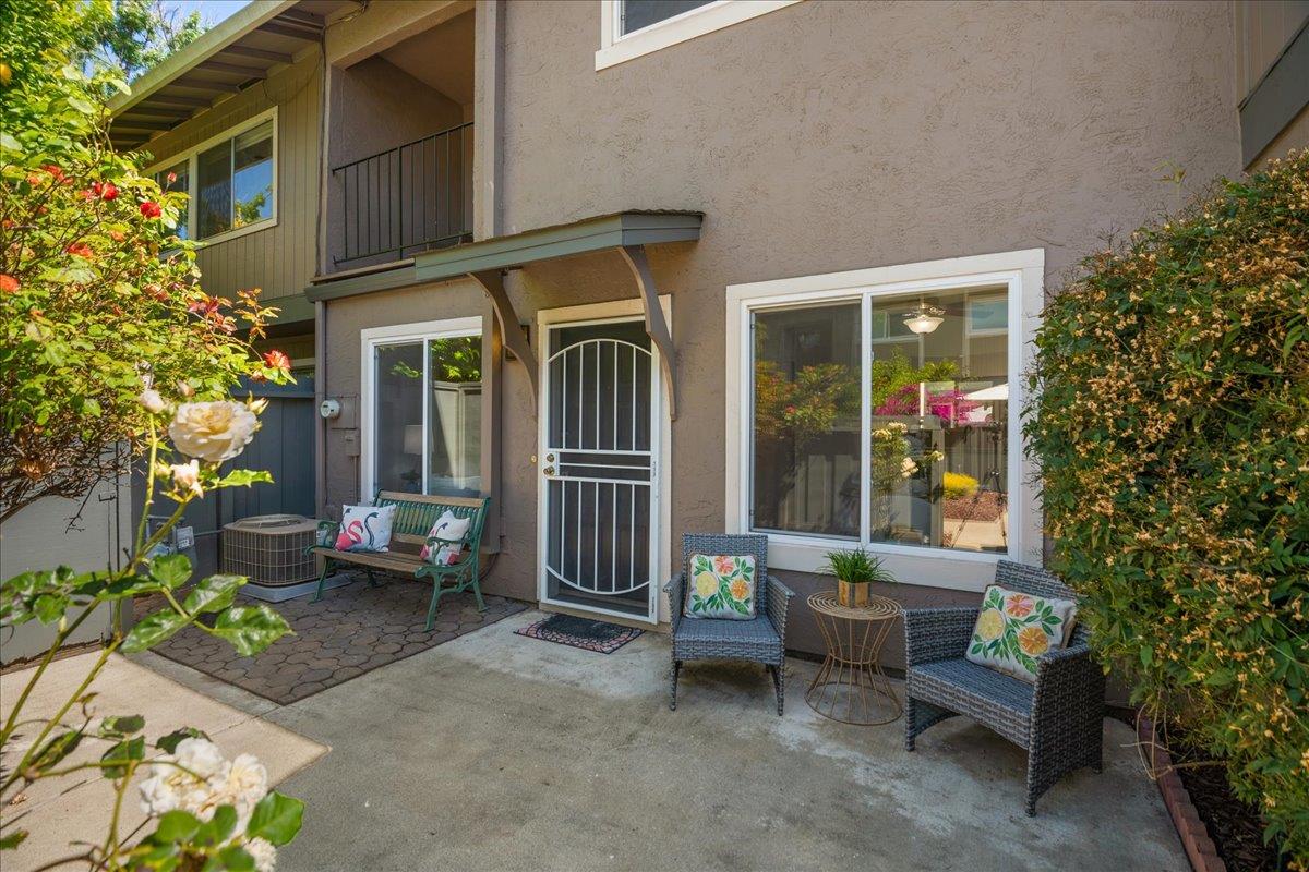 4790 Raspberry Place San Jose, CA 95129 - Photo 25 of 45 front view of a house with a chairs and table in a patio