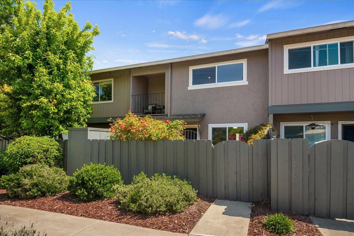 4790 Raspberry Place San Jose, CA 95129 - Photo 26 of 45 a backyard of a house with plants and wooden fence