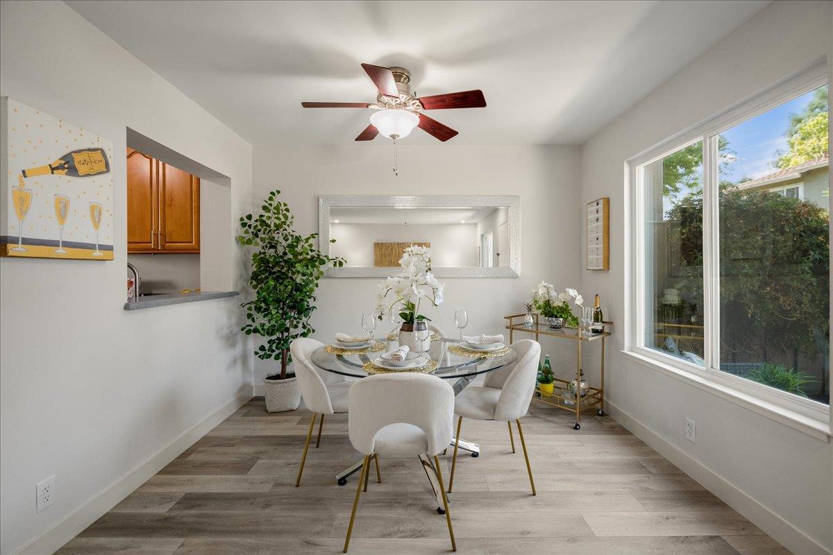 4790 Raspberry Place San Jose, CA 95129 - Photo 6 of 45 a dining room with furniture windows and wooden floor