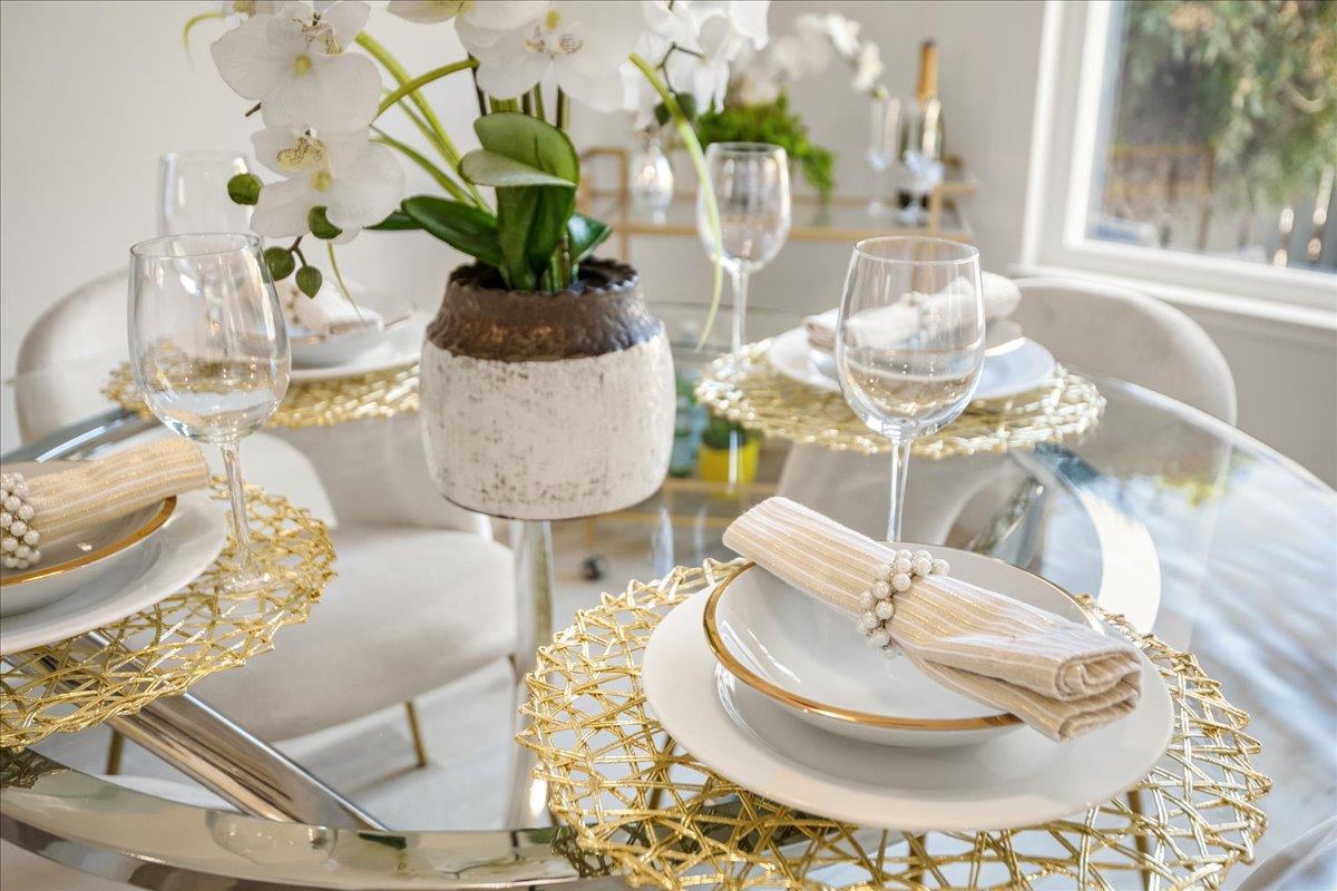 4790 Raspberry Place San Jose, CA 95129 - Photo 8 of 45 a vase of flowers sitting on a dining table