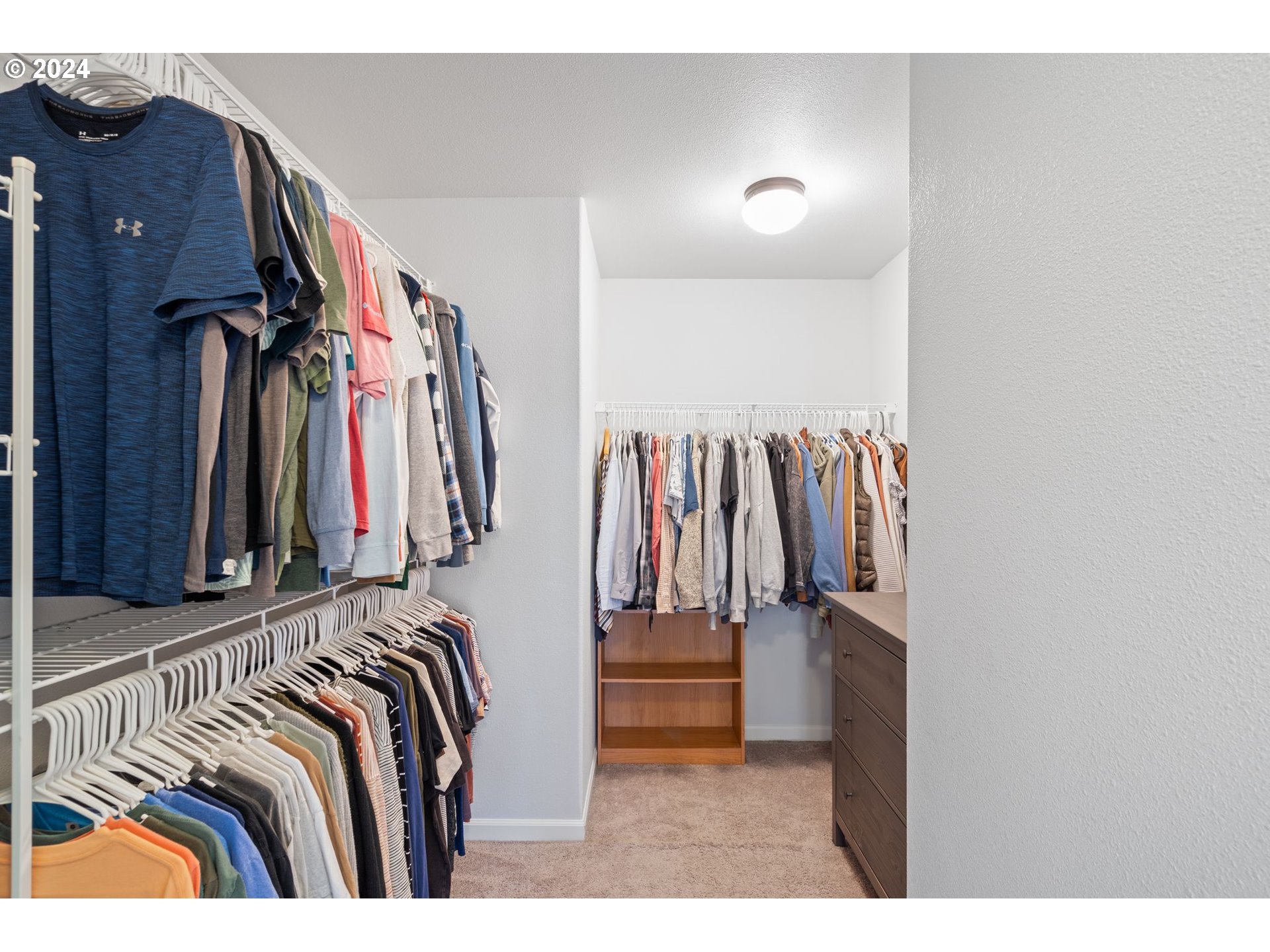3519 North 6th Circle Ridgefield, WA 98642 - Photo 15 of 40 a view of walk in closet with clothes