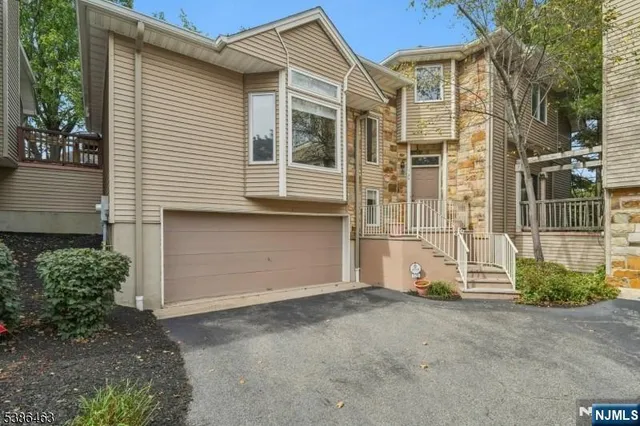 a view of a house with a garden