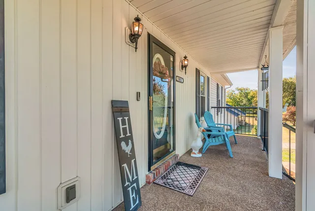 a view of a porch with furniture