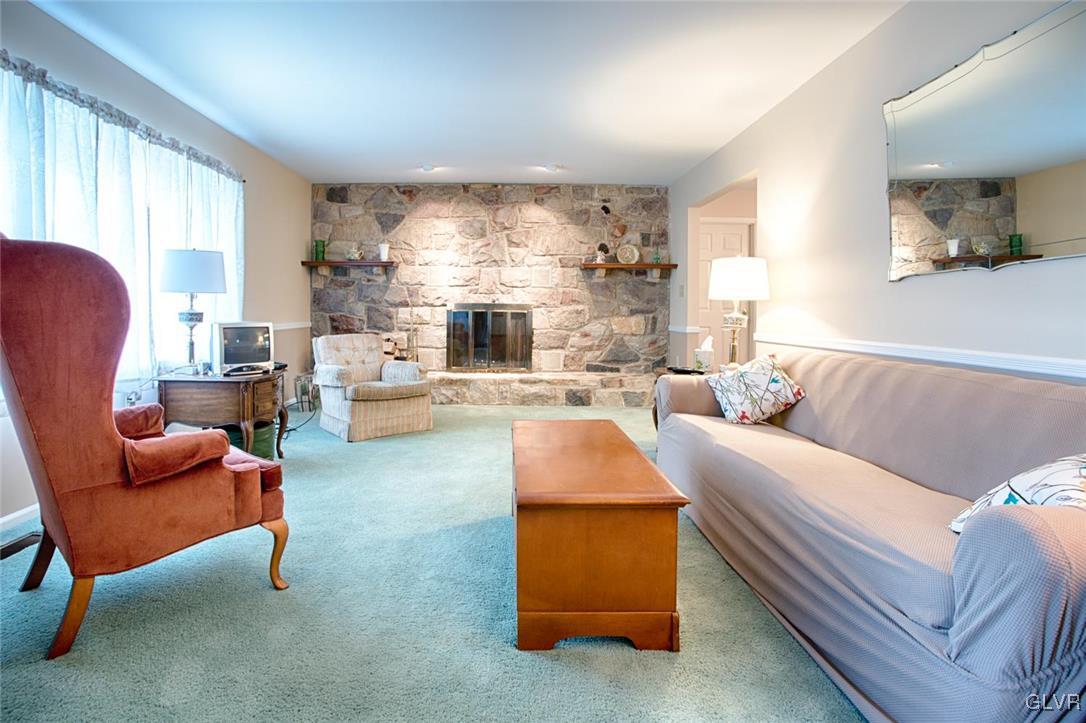 First floor Living Room with beautiful fireplace.
