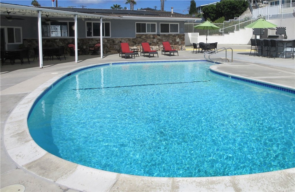 102 Sandy Drive San Clemente, CA 92672 - Photo 14 of 16 a view of a house with a backyard