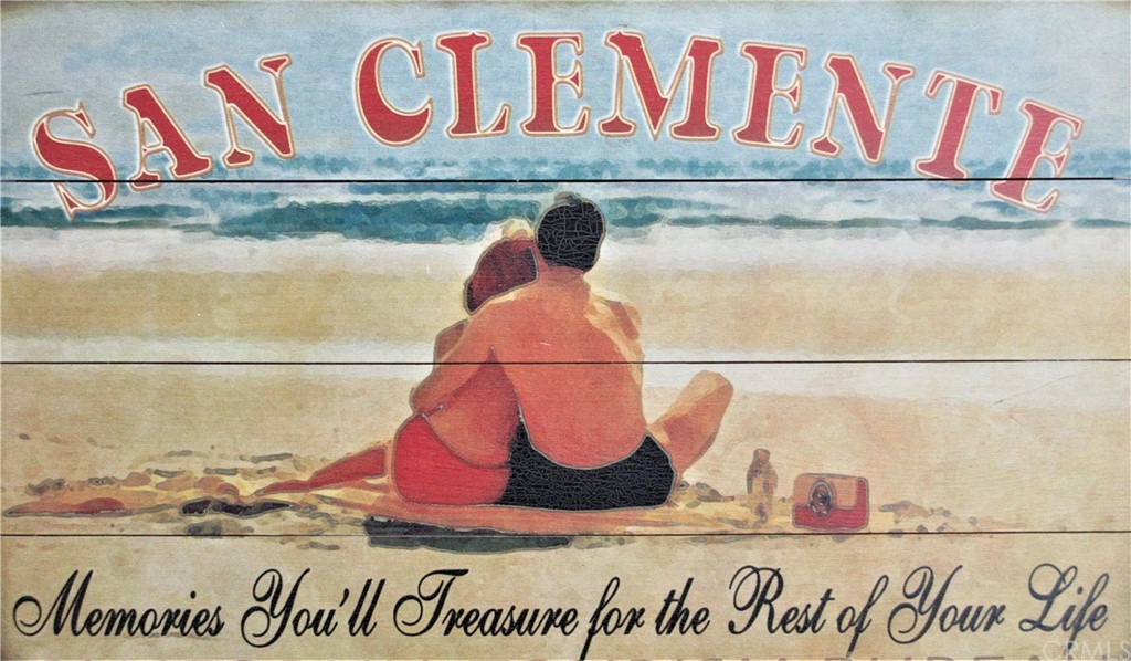 102 Sandy Drive San Clemente, CA 92672 - Photo 15 of 16 a street sign on a wall with wall in wall