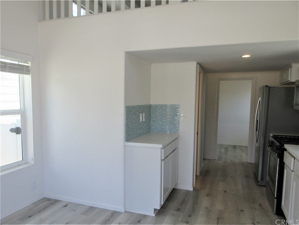 102 Sandy Drive San Clemente, CA 92672 - Photo 6 of 16 a utility room with a sink dryer and washer