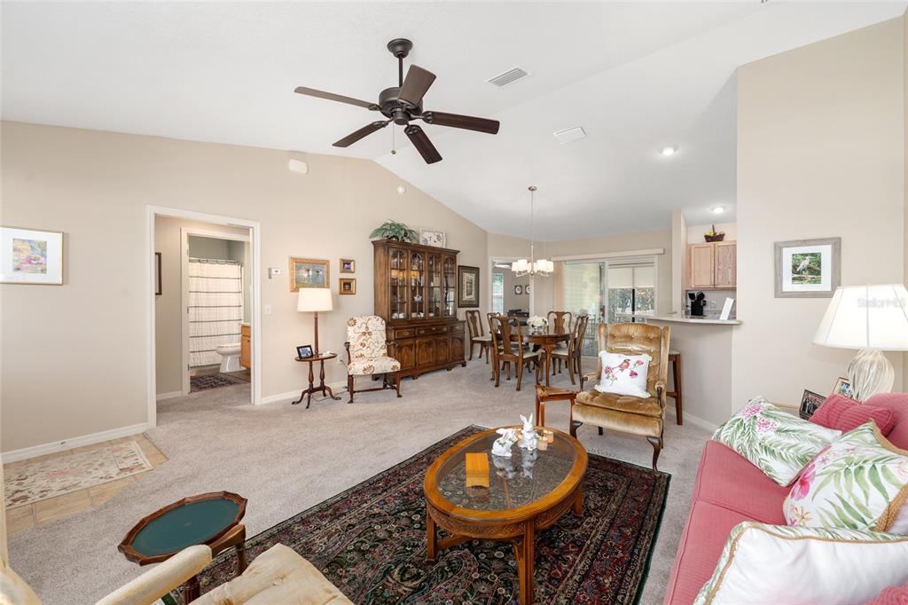 771 Fenwick Loop The Villages, FL 32163 - Photo 11 of 51 a living room with furniture and a view of kitchen