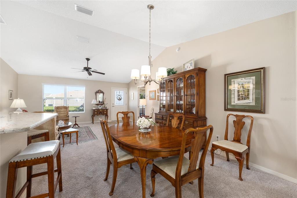 771 Fenwick Loop The Villages, FL 32163 - Photo 16 of 51 a view of a dining room with furniture
