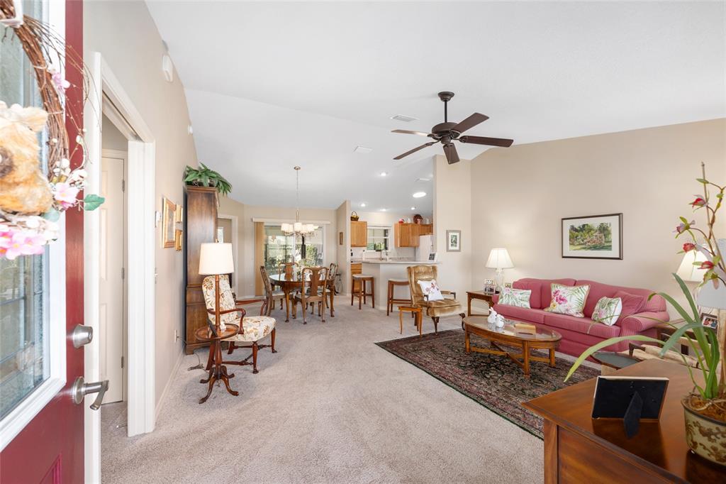 771 Fenwick Loop The Villages, FL 32163 - Photo 6 of 51 a living room with furniture and a large window