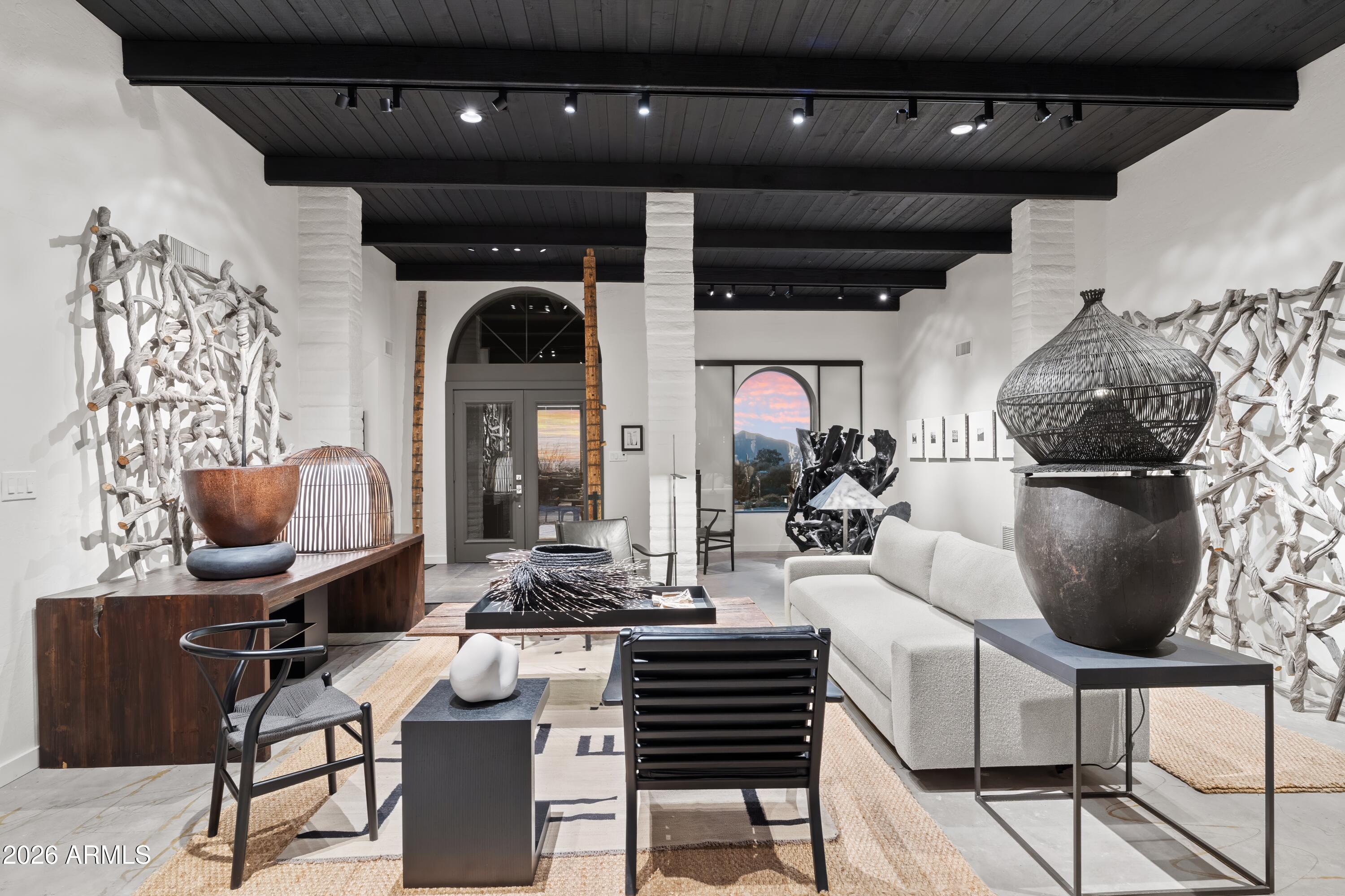 9545 East Romping Road, Unit 90 Carefree, AZ 85377 - Photo 10 of 59 a living room with furniture and wooden floor