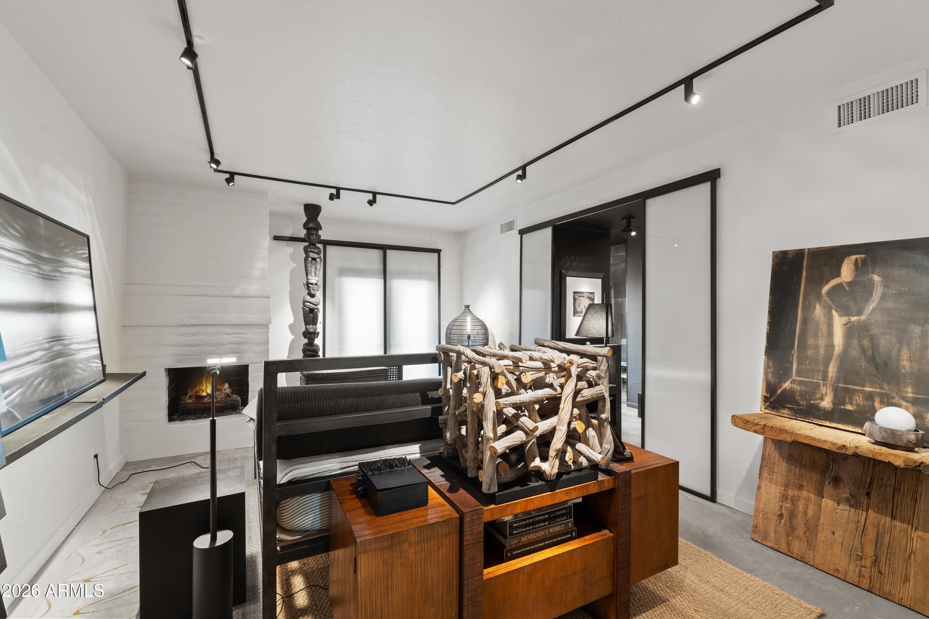 9545 East Romping Road, Unit 90 Carefree, AZ 85377 - Photo 27 of 59 Primary Bedroom with Fireplace