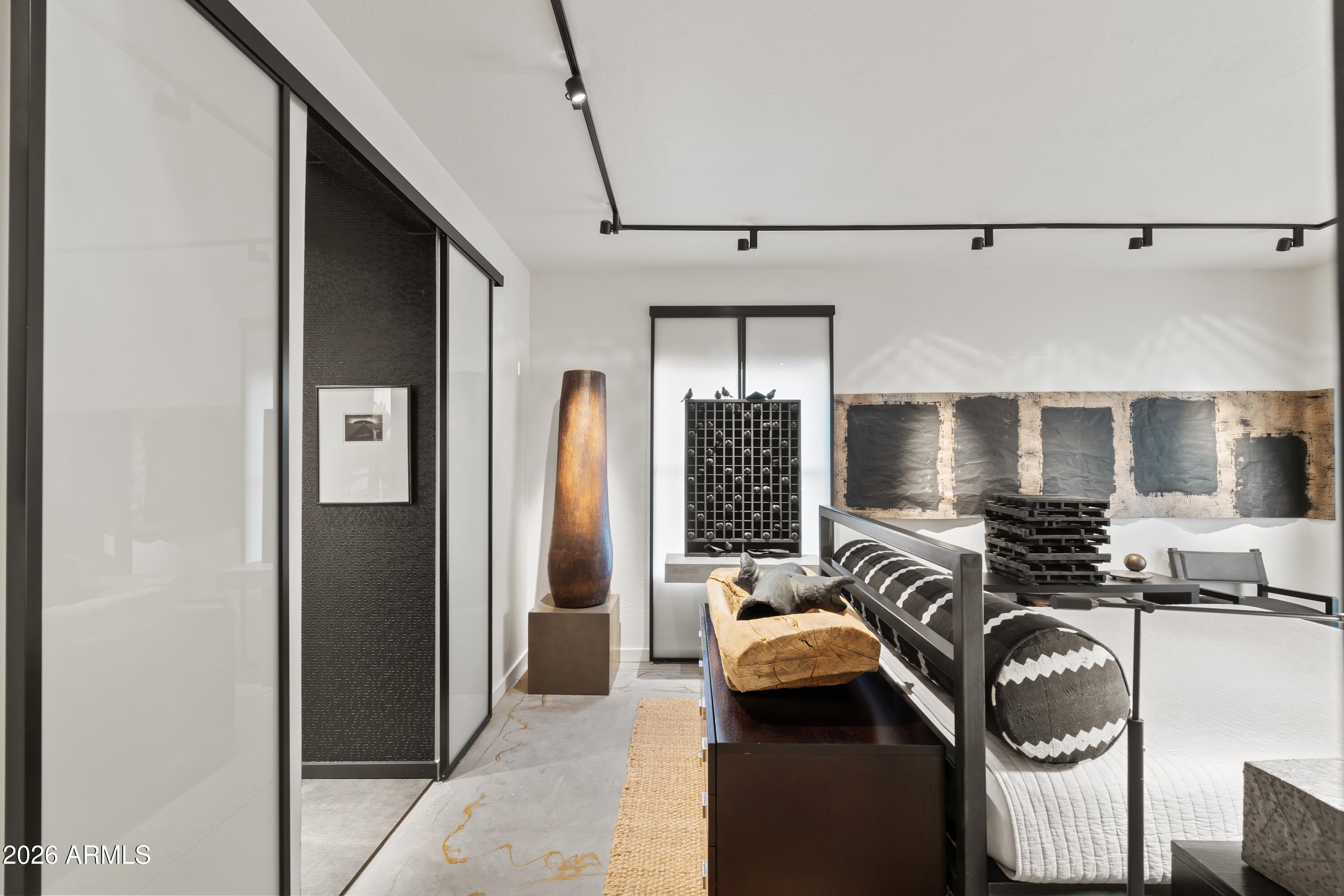 9545 East Romping Road, Unit 90 Carefree, AZ 85377 - Photo 31 of 59 a view of a livingroom with furniture and windows