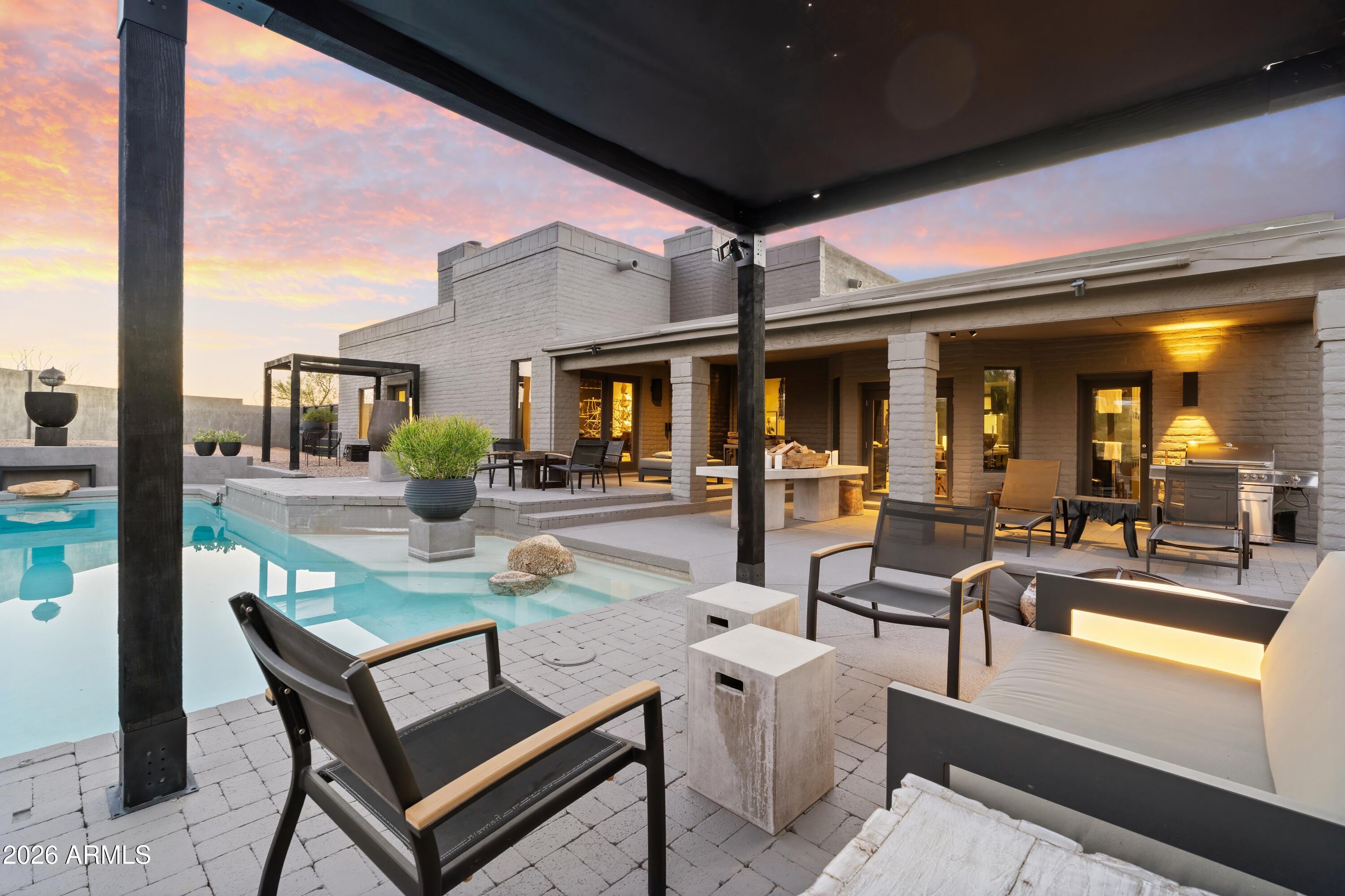 9545 East Romping Road, Unit 90 Carefree, AZ 85377 - Photo 40 of 59 a outdoor living space with furniture