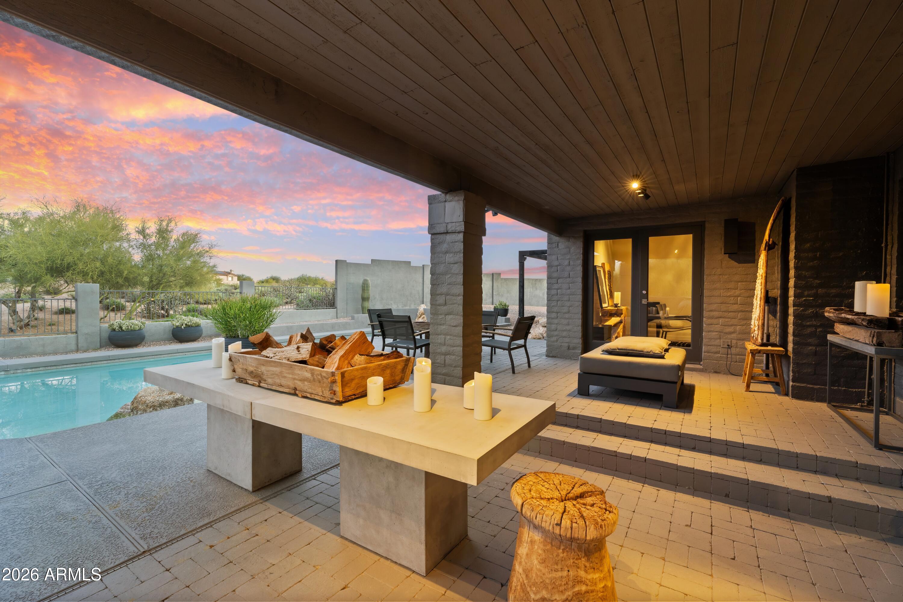 9545 East Romping Road, Unit 90 Carefree, AZ 85377 - Photo 45 of 59 a outdoor space with patio furniture and garden view