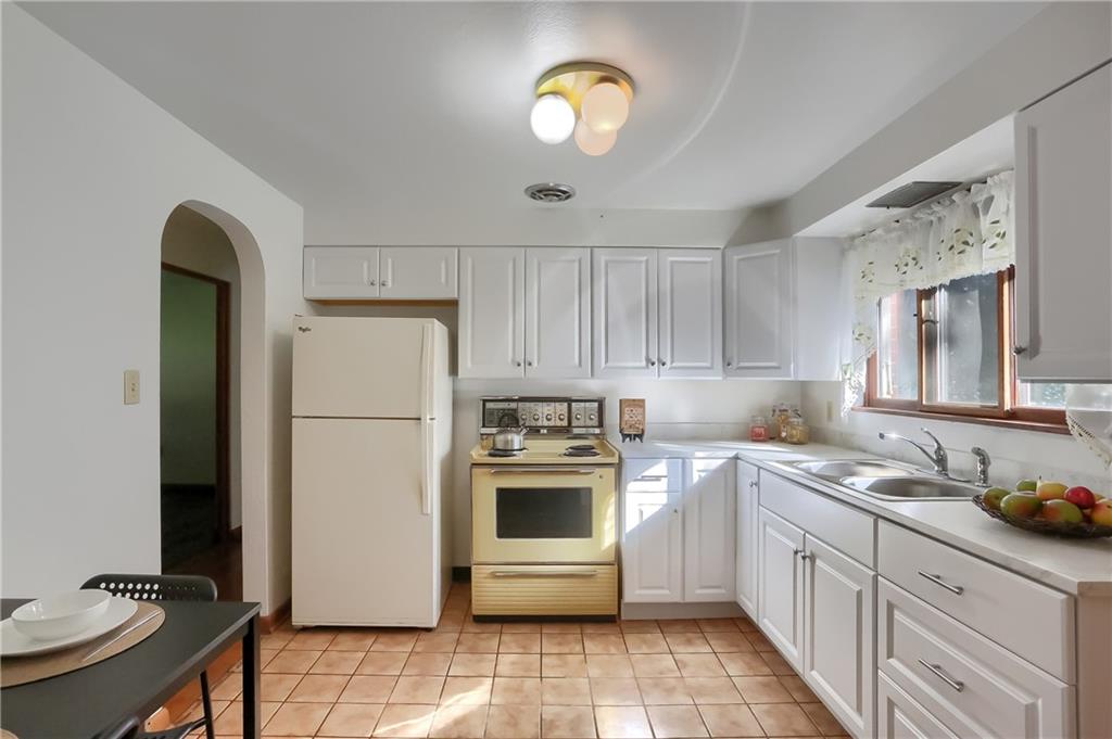 4126 Henderson Road Hickory, PA 15340 - Photo 11 of 25 a kitchen with a sink cabinets and stainless steel appliances