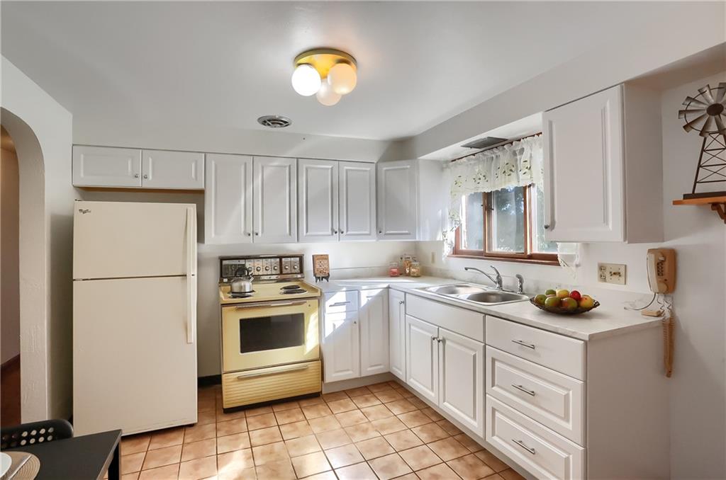 4126 Henderson Road Hickory, PA 15340 - Photo 12 of 25 a kitchen with a sink stove and refrigerator