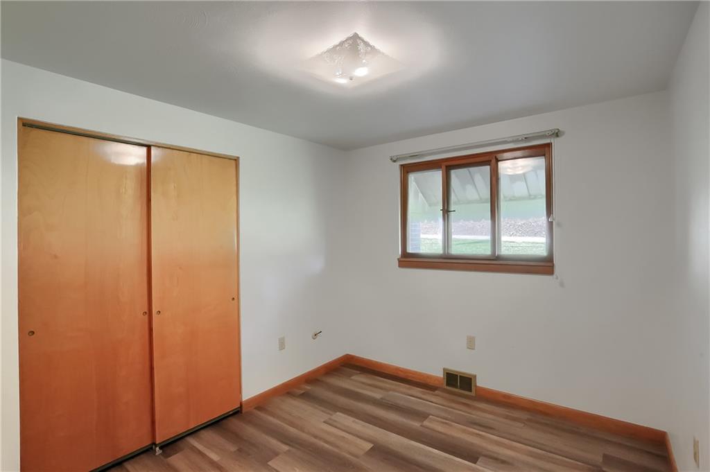4126 Henderson Road Hickory, PA 15340 - Photo 17 of 25 wooden floor in an empty room with a window