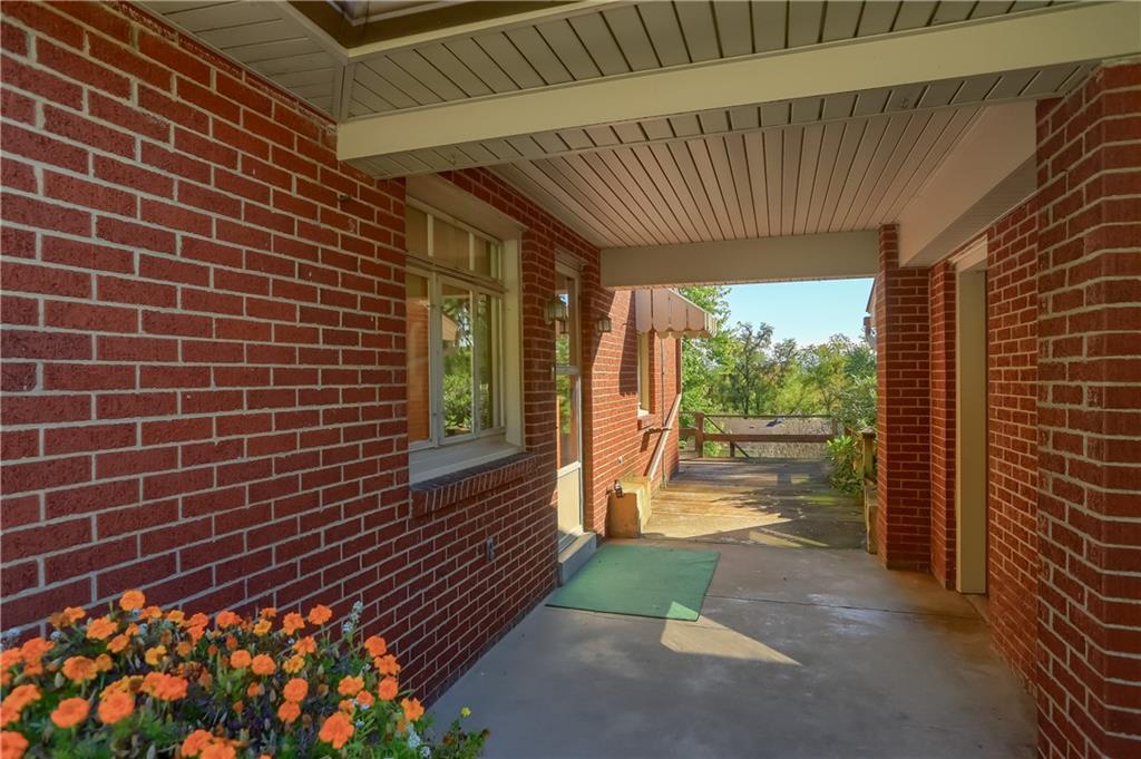 4126 Henderson Road Hickory, PA 15340 - Photo 21 of 25 a view of a patio with a table and chairs and potted plants